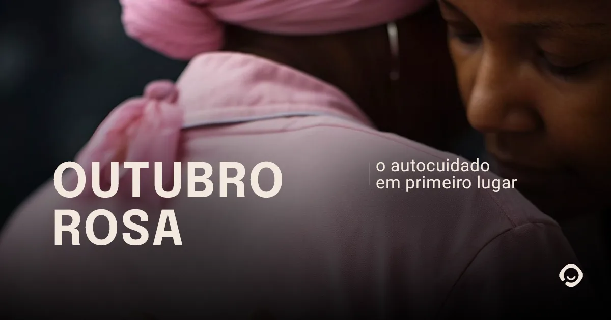 Duas mulheres se abraçando, uma com blusa rosa, escrito "Outubro Rosa, o autocuidado em primeiro lugar"